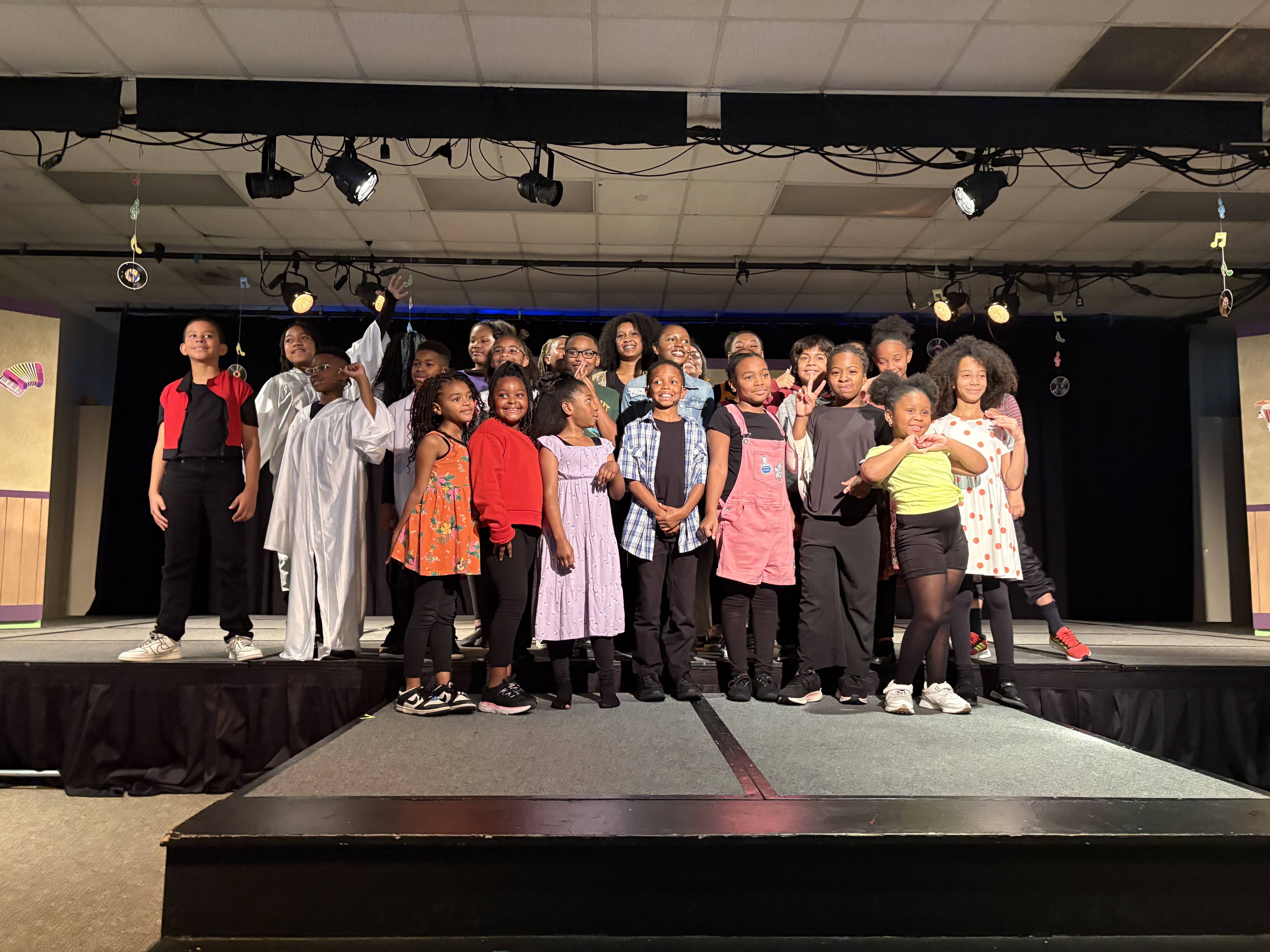 Blokk Akademy young people together on stage after a program performance in Los Angeles